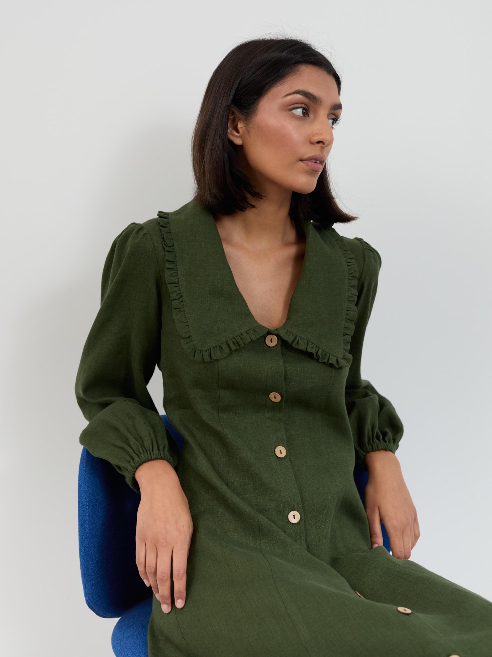 Detail of the Aubrey linen dress puff sleeve with elasticated cuff in forest green