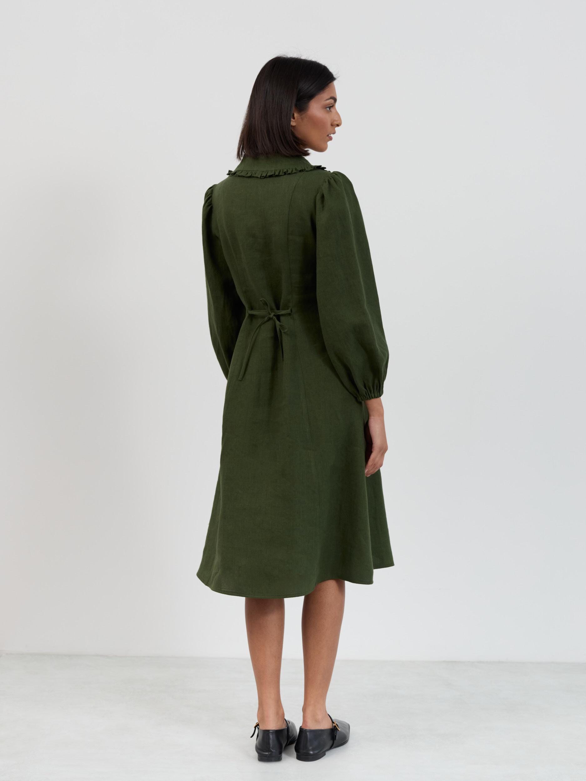 Full-length view of the Aubrey linen button down midi dress in forest green showing relaxed fit