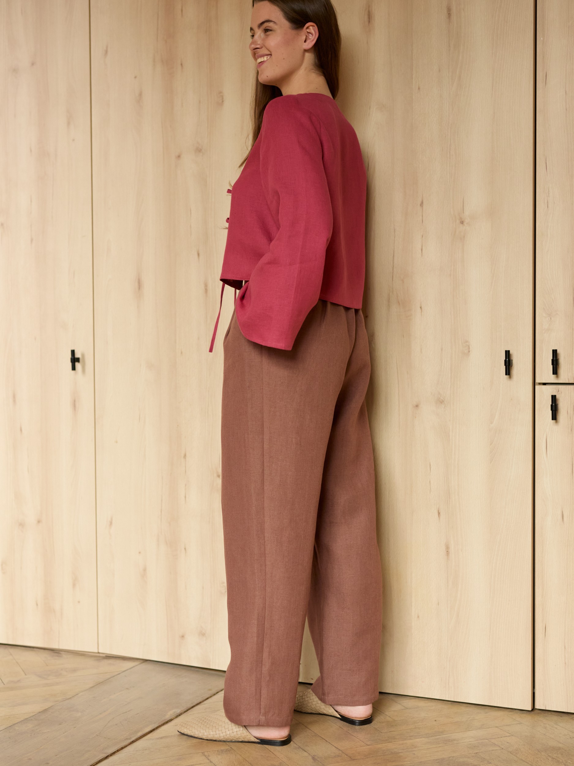 Image 5 of JAMES tailored linen pants in Heavy Dark Brown, featuring a high waist, pleated front, and side pockets, from Love and Confuse.